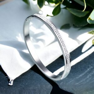 Anett ezüst színű 2 soros kristály köves ovális merev nemesacél karkötő