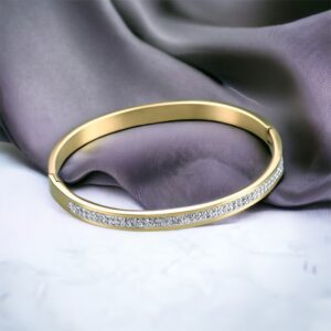 Anett arany színű 2 soros kristály köves ovális merev nemesacél karkötő